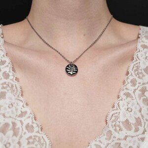 Gothic witch black and silver plant necklace with a small silver chain